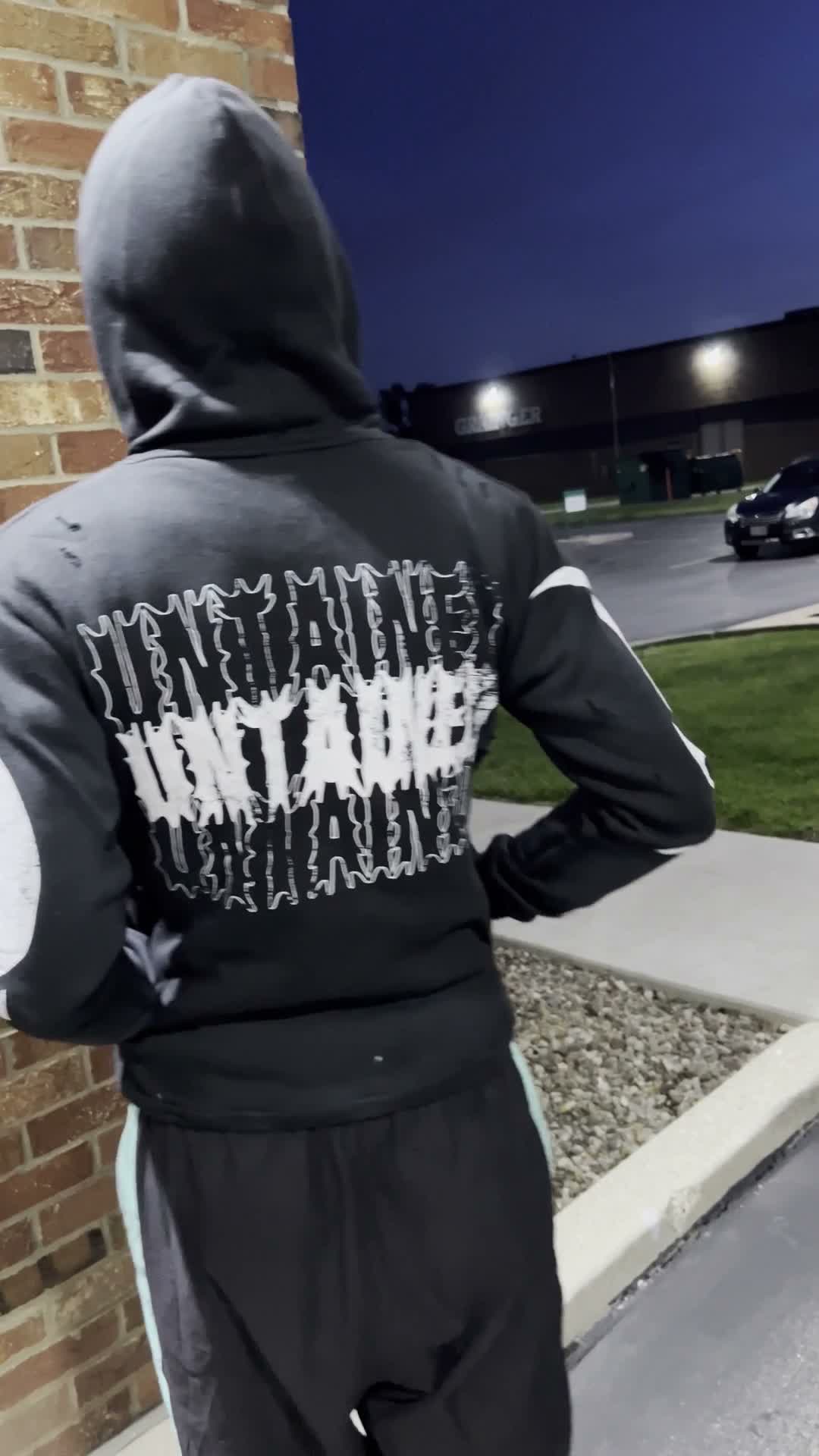 Reaper tracksuit worn on body, full design visible