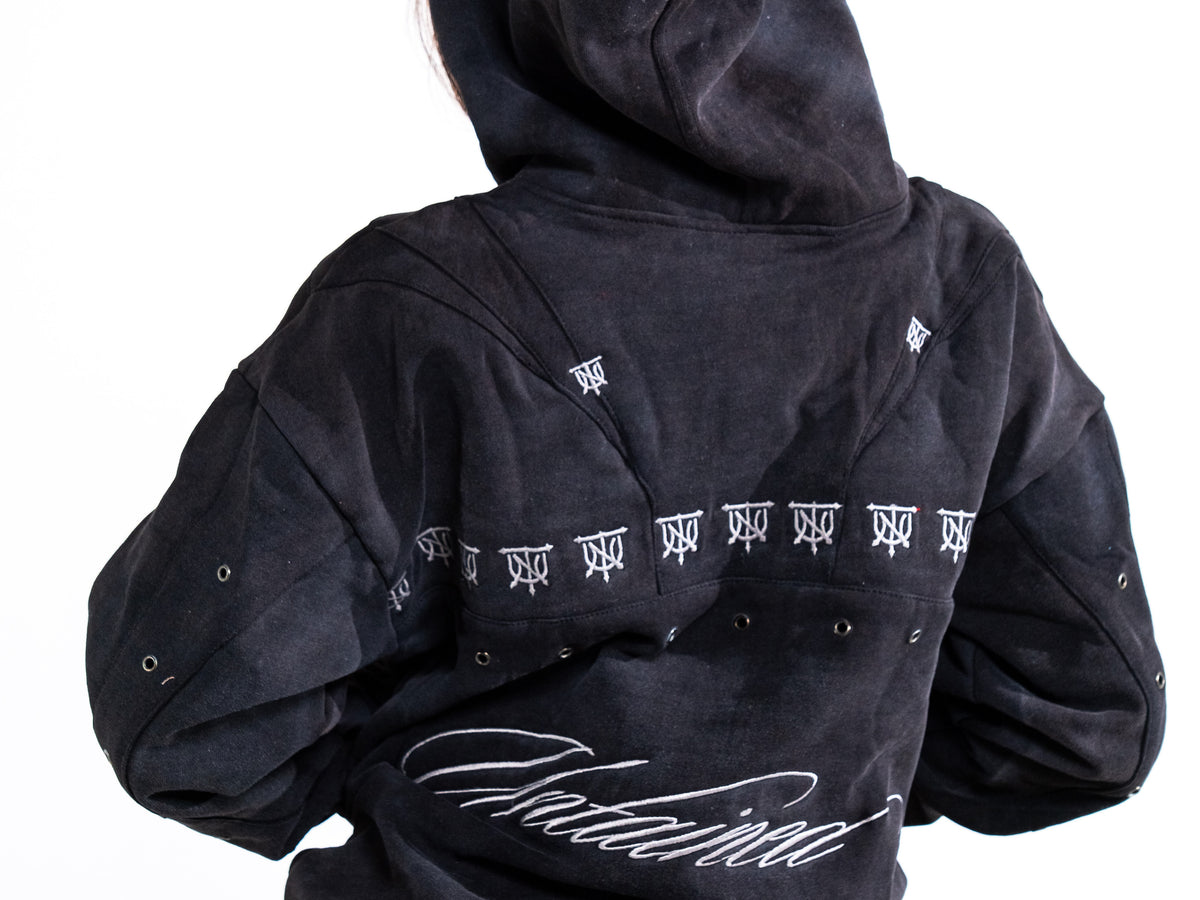 UNTAINED Sinner's Script hoodie worn by a model