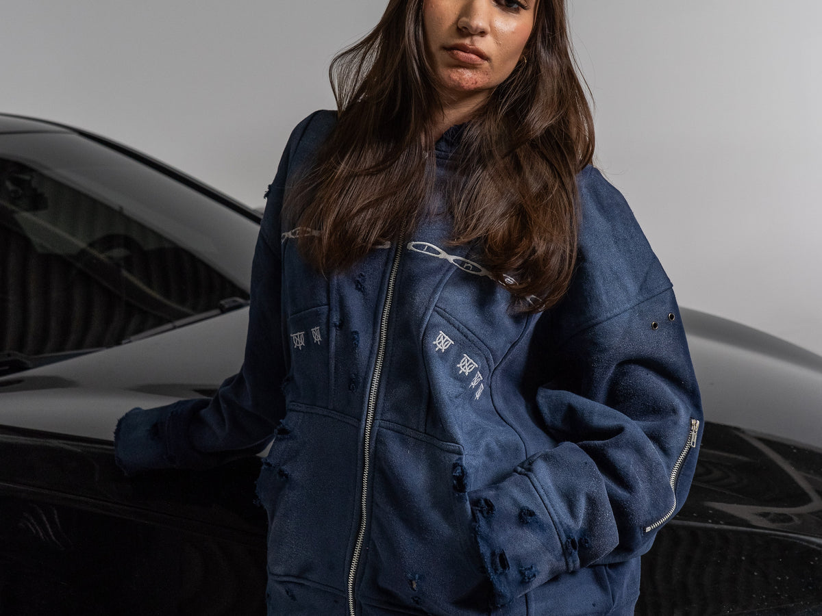 UNTAINED Never Cold hoodie worn by a model