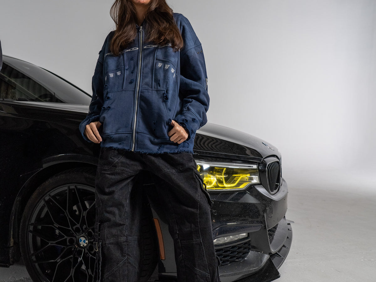UNTAINED Never Cold hoodie worn by a model